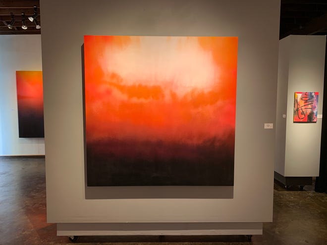 Kevin Greer's "Atomic" holds the wall and the room at Davis Gallery.