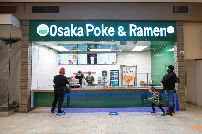 Customers wait for their orders at Osaka Poke and Ramen in the Pueblo mall on Thursday February 4, 2021.