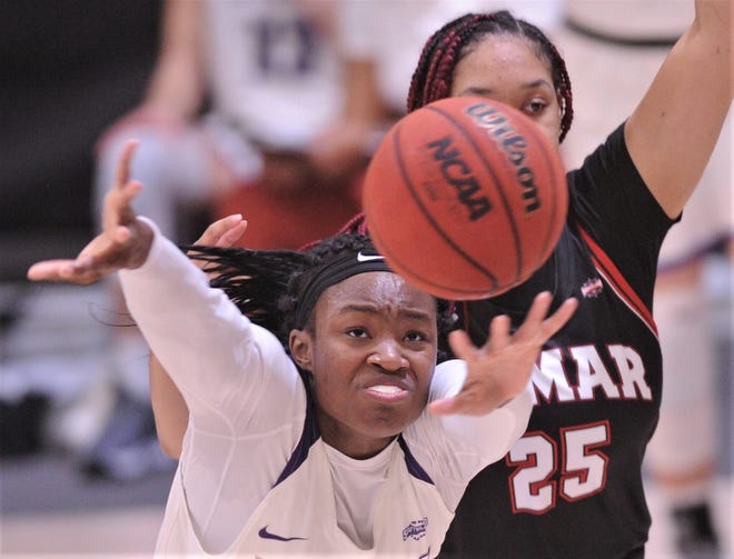 ACU's Alyssa Adams is fouled by Lamar's Bebe Galloway (25) with 15 seconds left in the game. Adams hit both free throws for the game's final points.