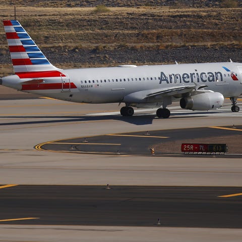 An American Airlines flight waits for takeoff at P