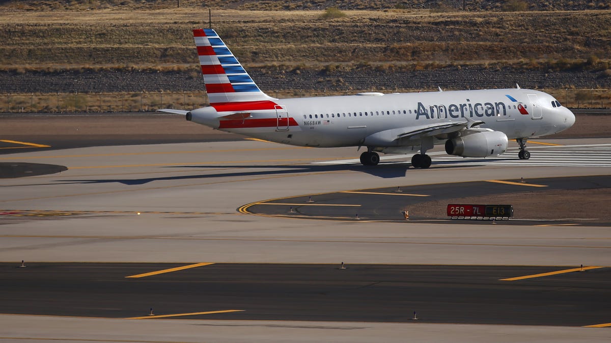 An American Airlines flight waits for takeoff at Phoenix Sky Harbor Airport on Feb. 4, 2021.