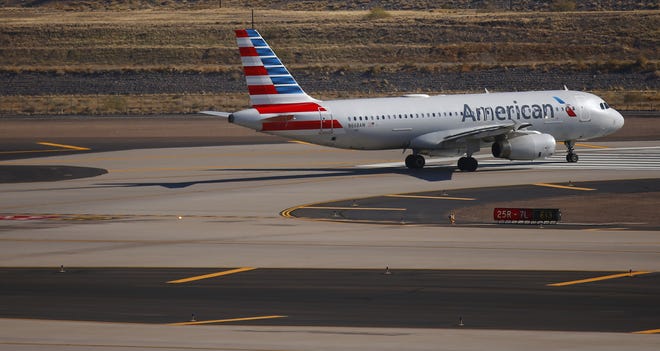 Woman enters not guilt plea on charges related to an incident that caused an American Airlines flight to diver to Phoenix in February.