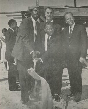 As originally published in a celebratory booklet, “the long-awaited historic day when action really began on the building for First Baptist Church…participating in the event as Pastor Rollins turns the initial shovelful of dirt are …Elder L.K. Griggs, Mayor F. Bogert, and Dr. James H. Blackstone, Jr.