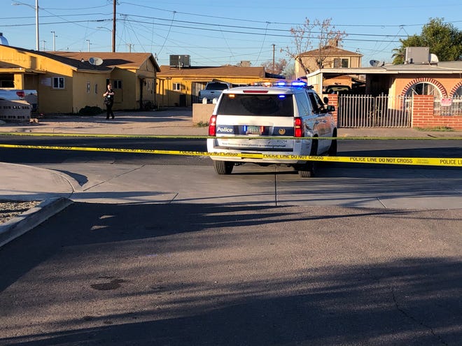 Phoenix police investigate a fatal shooting near Mohave Street and Ninth Avenue on Feb. 5, 2021.