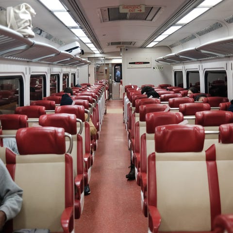 NEW YORK, NEW YORK - Nearly empty train cars make 