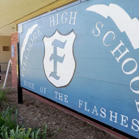 Parents come and pick up supplies at Fillmore High