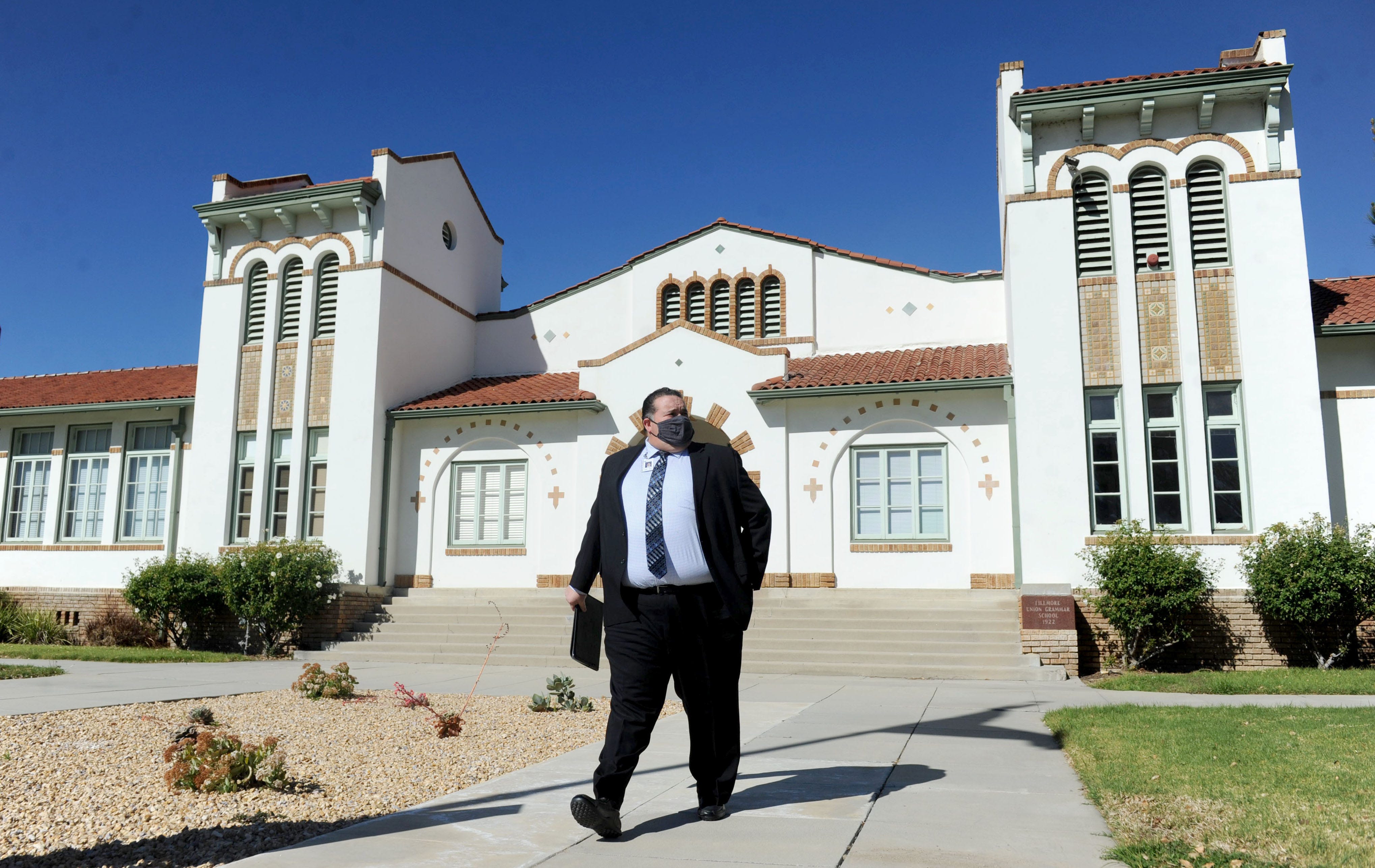 Fillmore Superintendent Adrian Palazuelos, who stepped down recently, walks out of his office on Friday, Feb. 5, 2021, at Fillmore Unified School District.