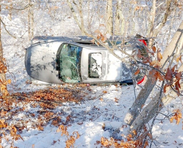 No injuries were reported in a crash Monday morning in which a vehicle left Route 28 in Falmouth and rolled over into the woods. [Dave Curran]