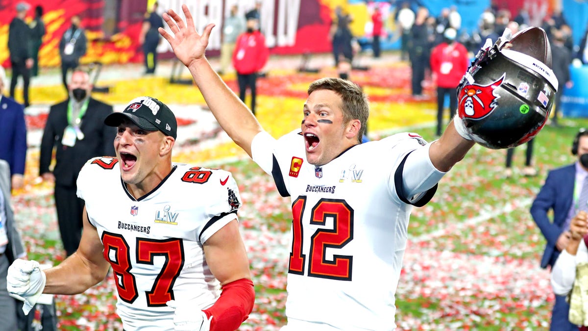 Rob Gronkowski and Tom Brady celebrate after winning Super Bowl 55.