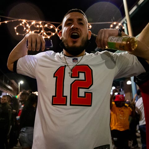 Fans celebrate in the streets of Ybor City in Tamp