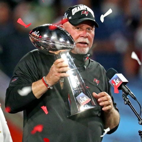 Buccaneers coach Bruce Arians celebrates with the 