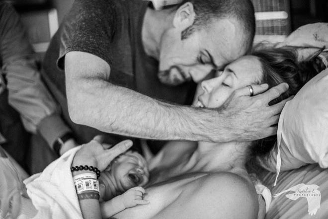 Kendra Brouwer and her husband Graeme Bouwer after the birth of their now five-year old son Burke.