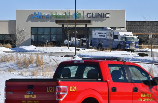 A Minneapolis Bomb Squad vehicle is parked near the entrance to the Allina Health Clinic Tuesday, Feb. 9, 2021, in Buffalo. 