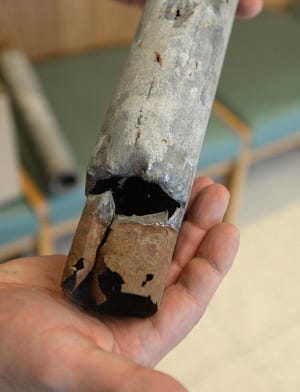 This is a piece of old pipe that had to be replaced in the plumbing system at the Erie County Technical School in 2019. Improvements to the school's heating, lighting and plumbing systems are among planned renovations at the school on Oliver Road in Summit Township.