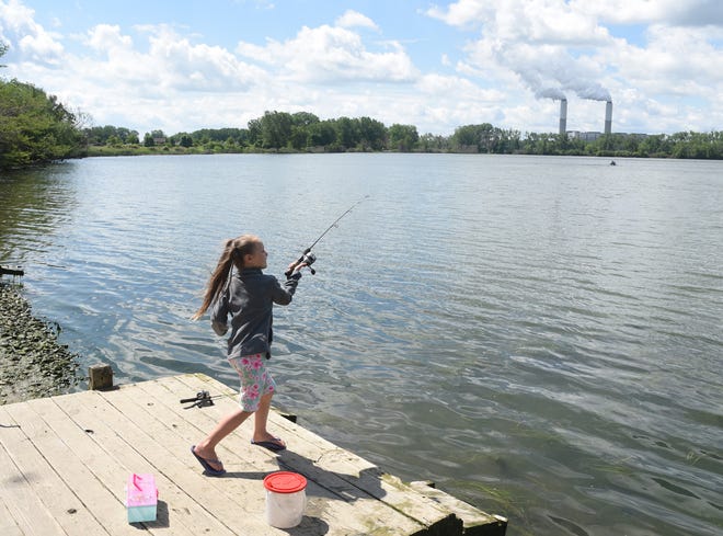 Kensley Slovik, 6, casts her line into the pond at Sterling State Park recently. [MONROE NEWS PHOTO BY TOM HAWLEY]