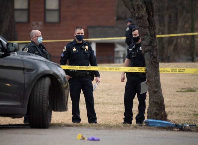 Metro police investigate where a man who ran from police officers in the JC Napier public housing complex accidentally shot himself along Claiborne St. Wednesday, Feb. 10, 2021 in Nashville, Tenn.