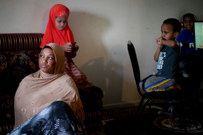 Hinda Hassan, 31, a refugee from Somalia with nine children, has been given a 45-day notice to get out of her home at Whispering Oaks apartment complex.