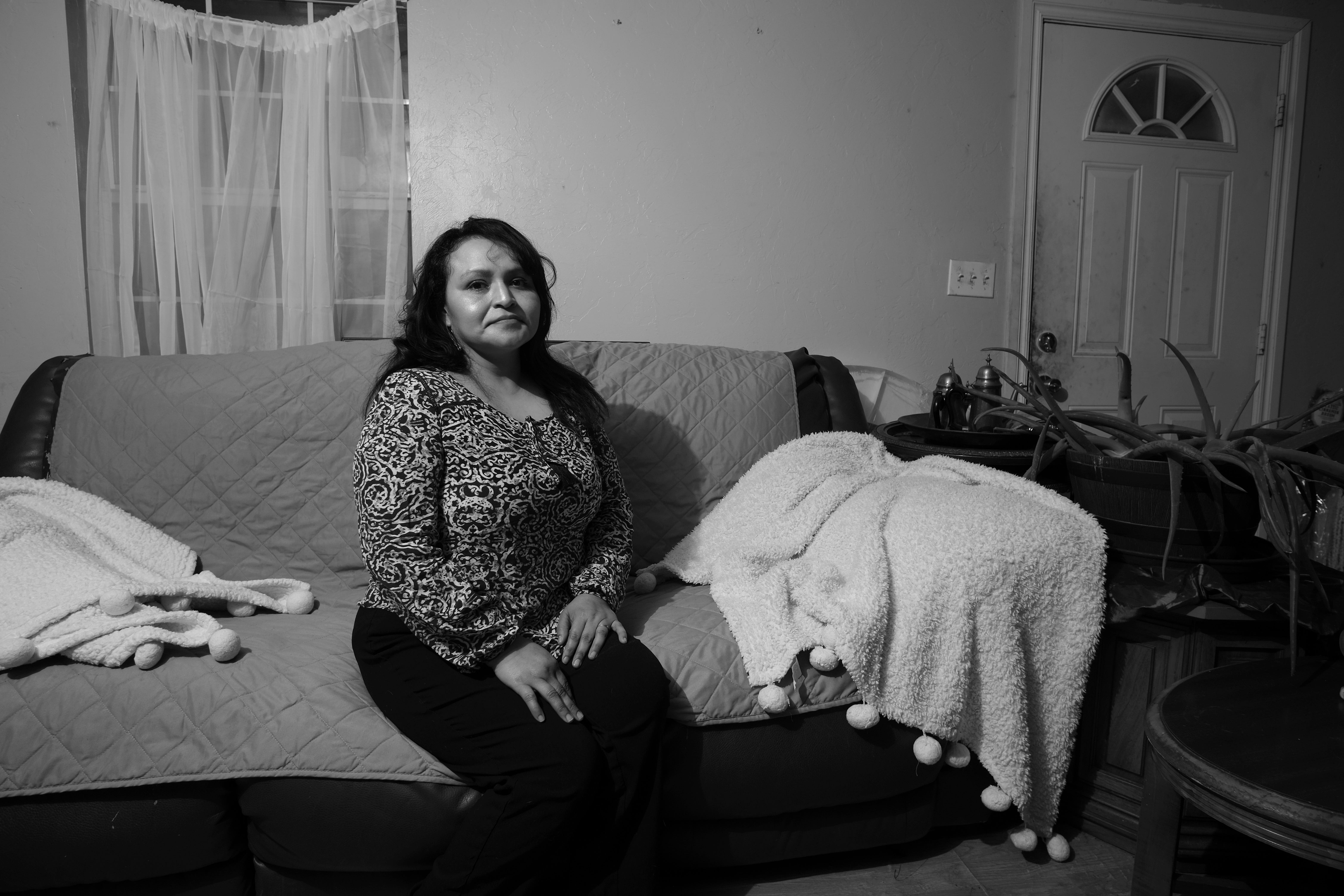 Blanca Keiser, who is a survivor of domestic violence, sits in her home in Oklahoma City on Jan. 29.