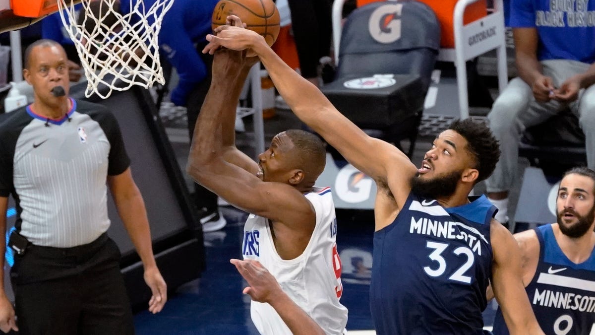 Karl-Anthony Towns of the Timberwolves returns after a long absence from COVID