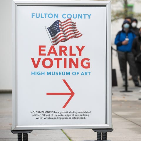 In Atlanta on Dec. 14, 2020, Georgians line up to 