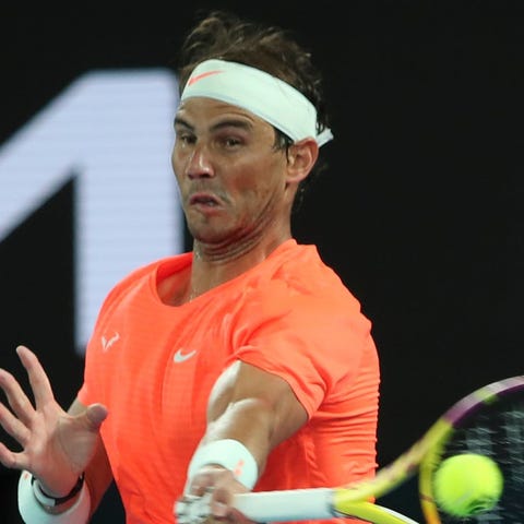 Spain's Rafael Nadal hits a return against Michael