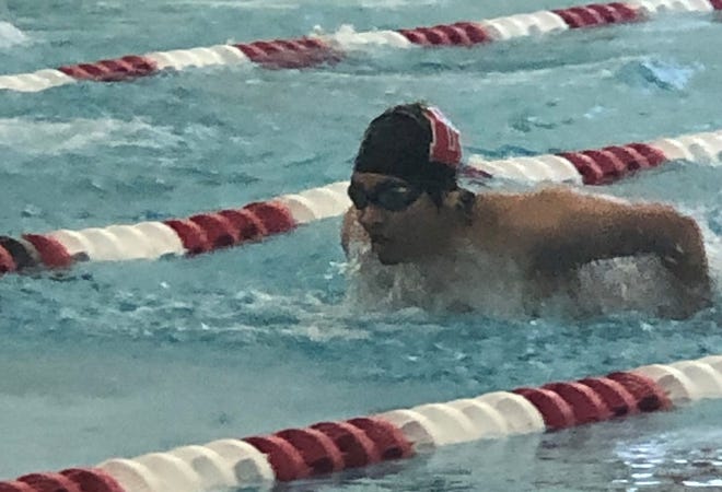 Durfee's Benjamin Hankerson swims the 100 freestyle event. Hankerson finished a career-best time of 58.65.