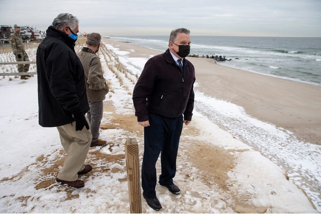 Officials from the Army Corps of Engineers and the DEP meet with local mayors, U.S. Rep. Chris Smith, and U.S. Rep. Andy Kim to tour storm damage from the Jan. 31-Feb. 3 nor'easter. The governor and NJDEP have asked the Army Corps to come in and help shore up beaches badly damaged from the storm, including Ortley Beach, Mantoloking, and Bay Head. U.S. Rep. Chris Smith surveys the damage in Bay Head. Bay Head, NJ Friday, February, 12, 2021