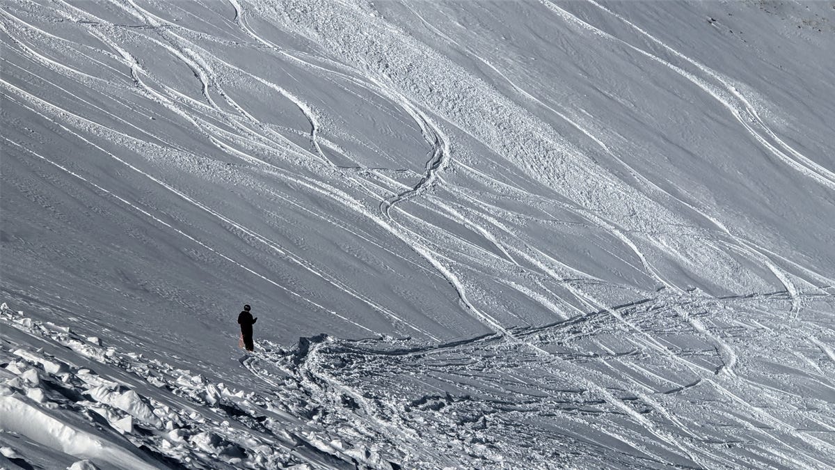 On the traverse at Breckenridge's Peak 6 toward Wonderland, a socially distanced skier ponders his descent.