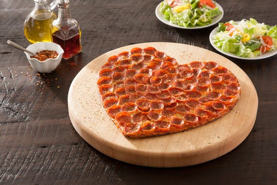 Donatos is one of many pizza chains serving up heart-shaped pizza for Valentine's Day.