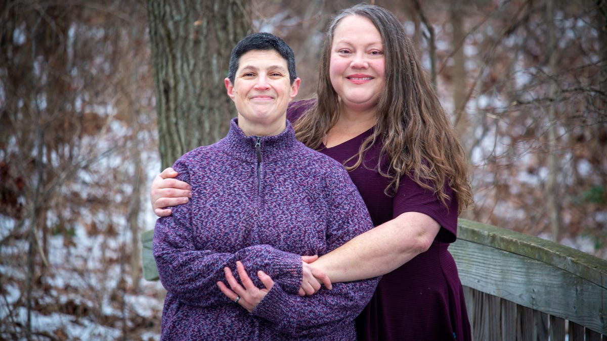 Kelly Newman (right) and her wife Rachel struggled with the strain of juggling work and the remote education as well as child care for their six children during the pandemic. Kelly quit her job in July.