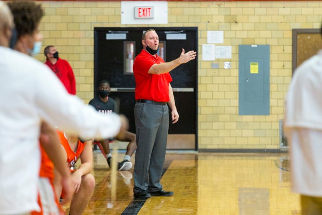East coach Roy Sackmaster, shown in a game against Harlem last season, wants the NIC-10 to draw up guidelines on how to determine the conference boys basketball champion this year if games that could impact the conference race are cancelled for COVID reasons.