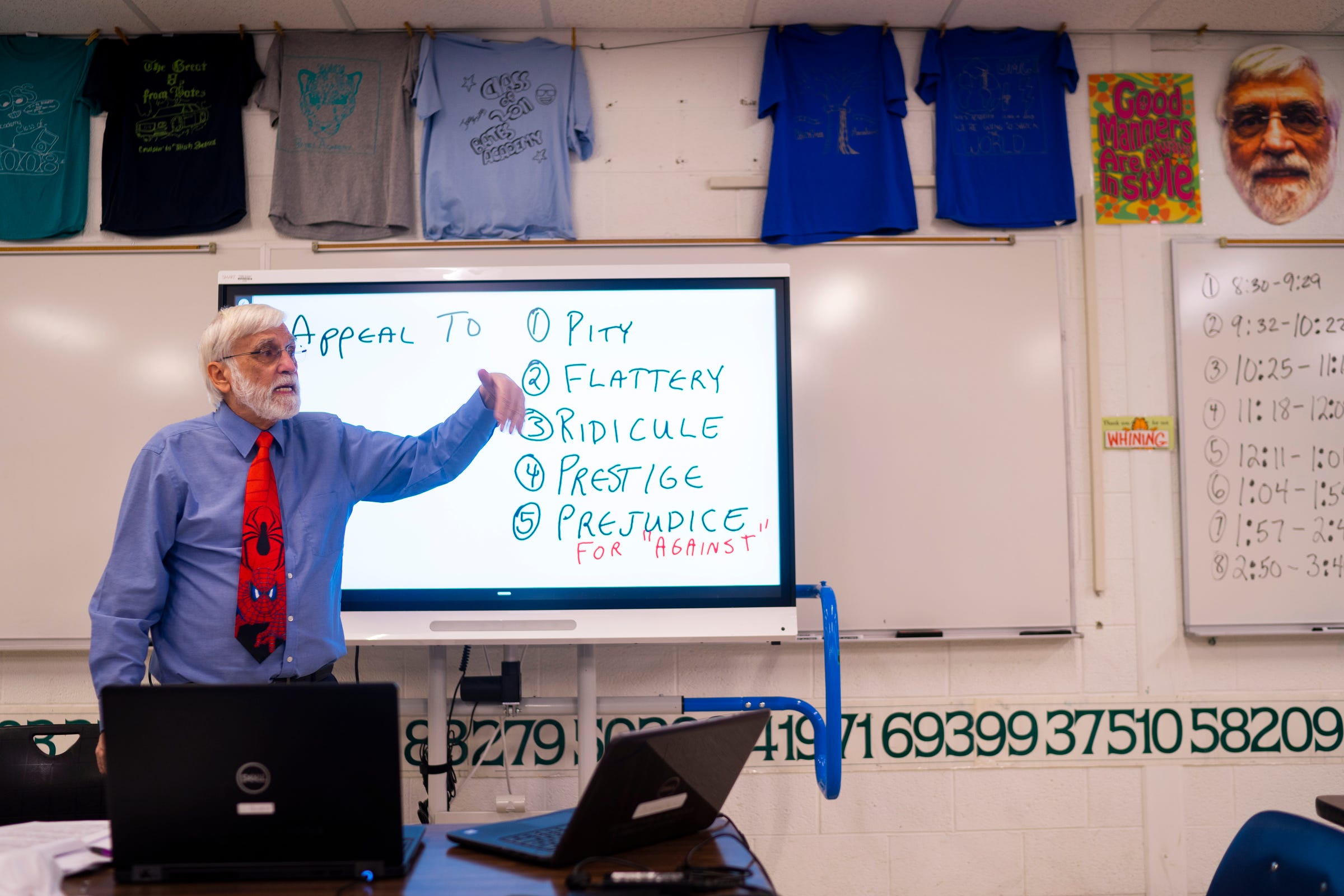 Christopher Holstein discusses segments of propaganda techniques during a virtual practice for an upcoming competition in the Academic Games on Feb. 4, 2021 at Bates Academy in Detroit. Holstein, an educator of 52 years, is celebrating his 45th year as an Academic Games coach. "It keeps me going," Holstein said regarding the Academic Games.