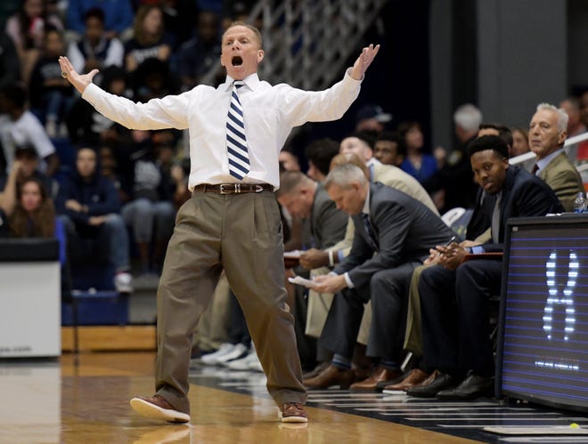 North Florida basketball coach Matthew Driscoll has already seen four of the Ospreys' A-Sun Conference games postponed due to COVID-19. As college basketball season enters the homestretch, local teams can only hope the coronavirus doesn't strike them at the worst possible time.