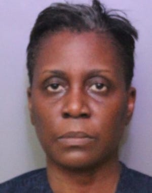 Bartow Middle School math teacher Liquindella Clark was arrested after police say she assaulted two students who were arguing with her child at a basketball game.