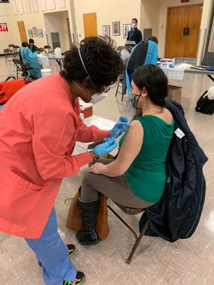 A woman given the COVID-19 vaccine on Monday, February 15, 2021.