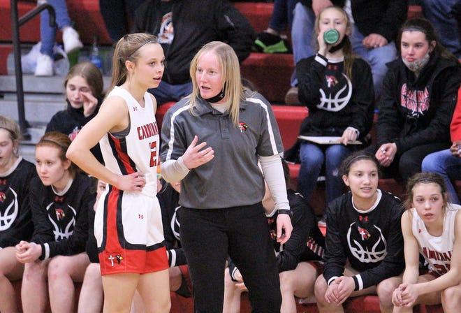 St. Mary coach Macie Michelson talks with Courtney Brown during the game vs. Howard in Dell Rapids on Feb. 11, 2021.