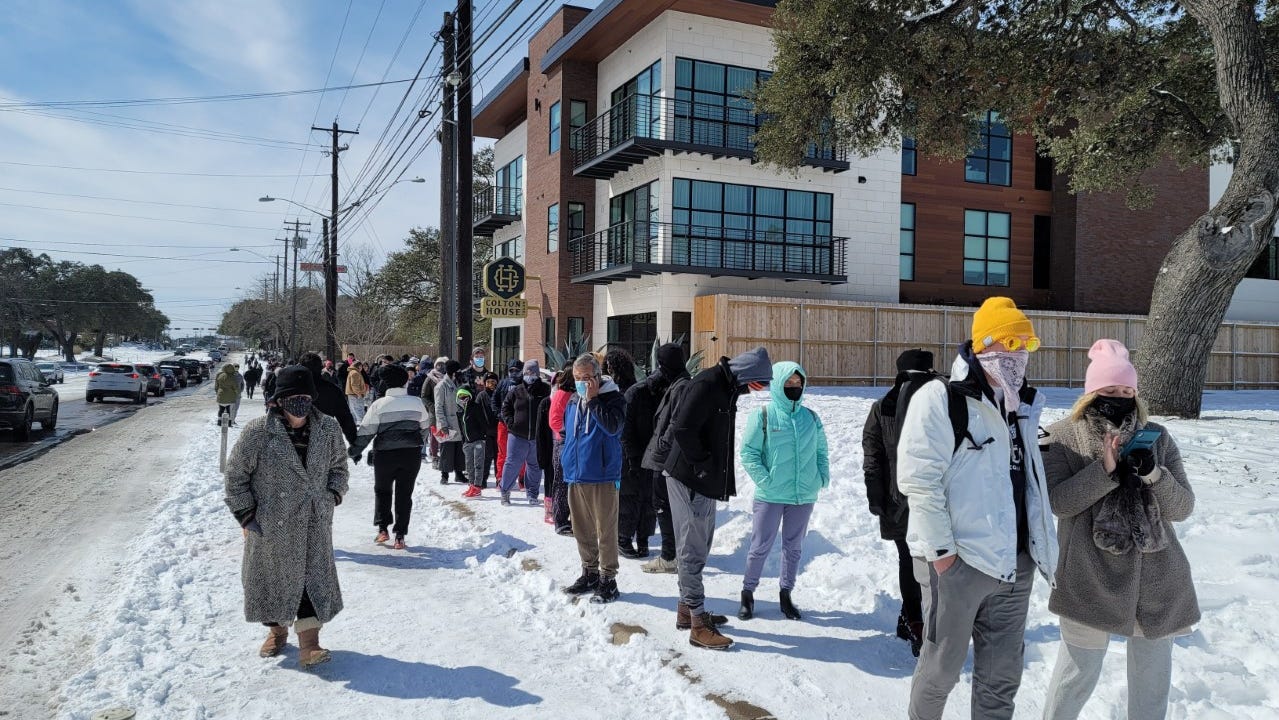 Hundreds wait in cold and snow at Austin H-E-B stores for chance to restock amid freeze, outages
