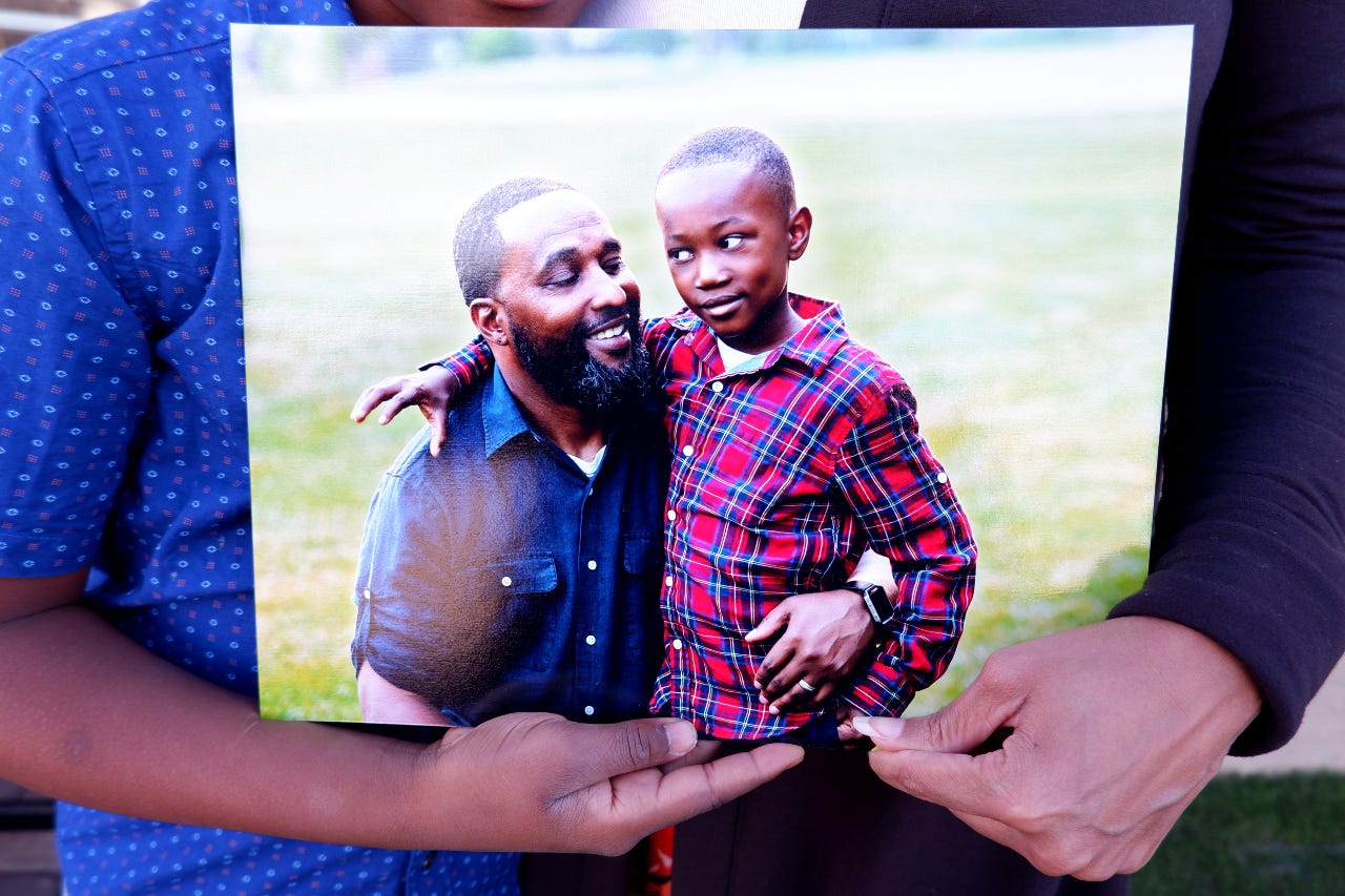 A photograph of Bryce McAllister and his father, Bruce McAllister, who died of COVID-19 in 2020. He was the first victim recorded in Washoe County.