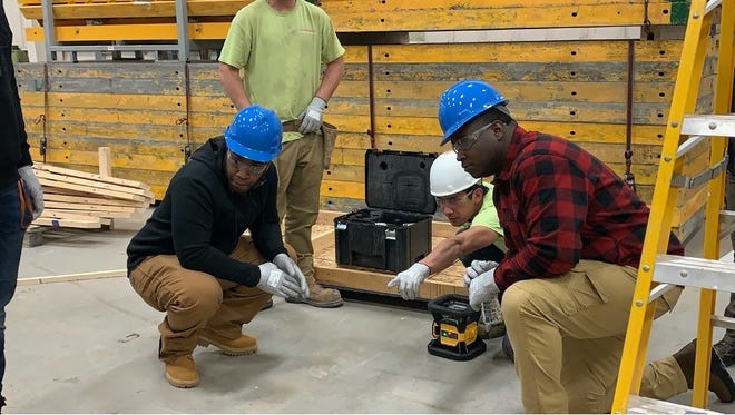 Participants in the Multi-craft Apprenticeship Preparation Program/Project Phoenix in Rochester are learning the building trades.