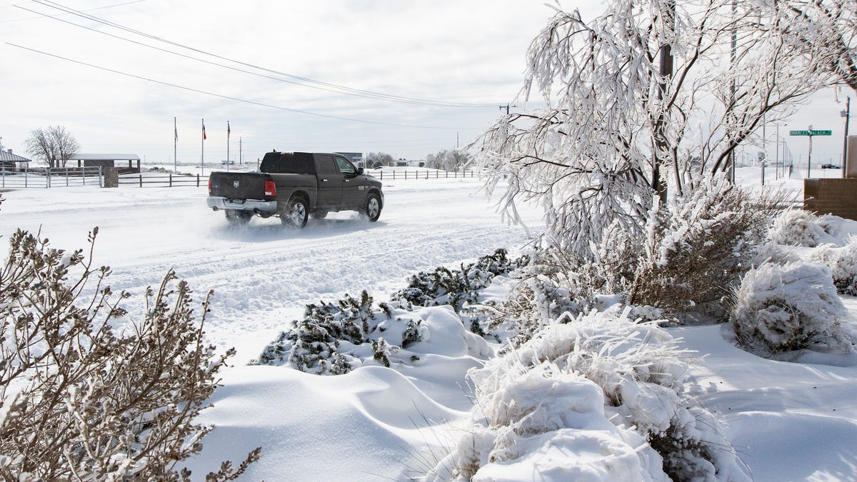 Ice and snow blanket parts of a Grandview Avenue and Charles Walker Road, Monday, Feb. 15, 2021 in Odessa, Texas.