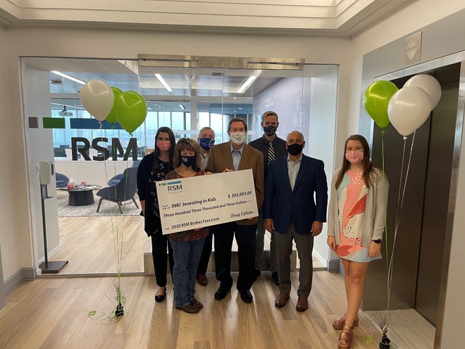 RSM, an audit and tax consulting firm, recently donated $303,003 to the St. Johns Education Foundation, or INK! Pictured are Alyssa Johnson, RSM (from left); Donna Lueders, INK!; Brian Corson, VyStar Credit Union; Mike Vergo, RSM; David Hartzel; INK !; Greg DeVino, RSM; and Taylor Lamb, RSM.