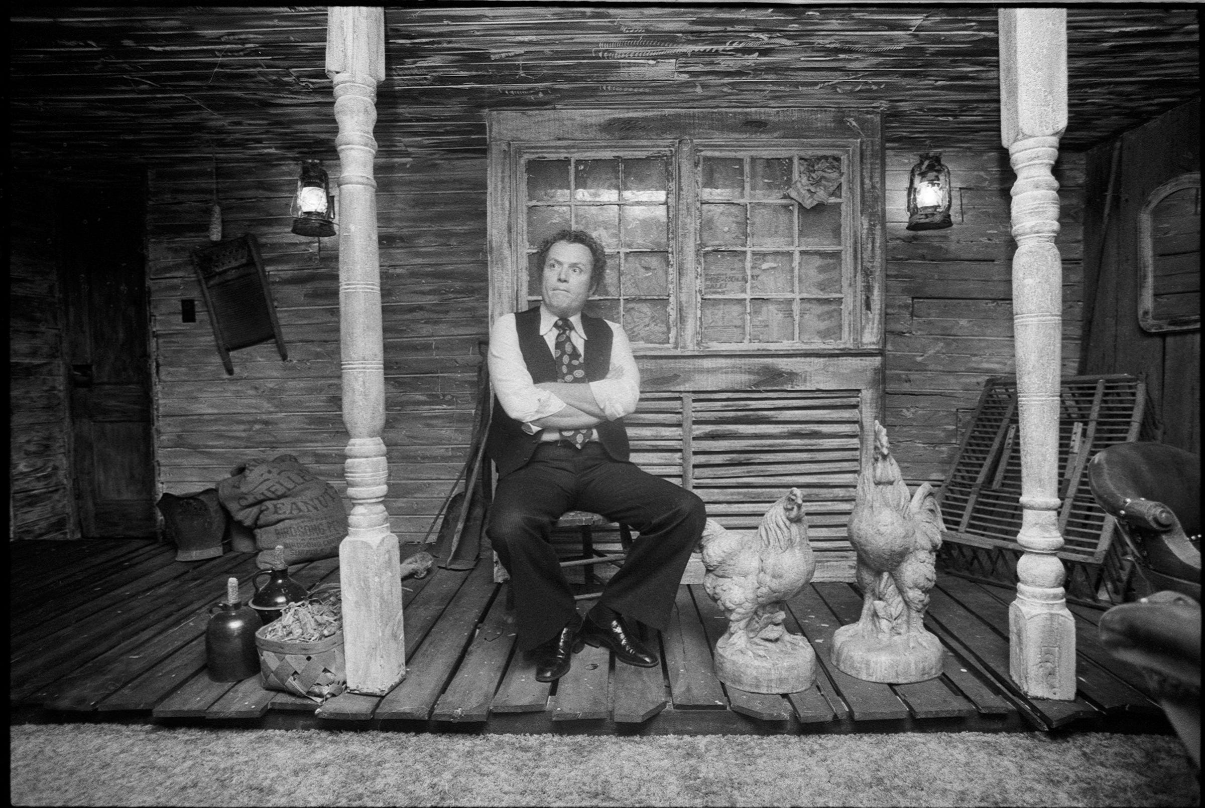 Kentucky native and Hustler Magazine publisher Larry Flynt sits in his "Kentucky Room," in the basement of his home in Columbus, Ohio. the room is a replica of the cabin he grew up in. By Jebb Harris, The Courier-Journal. Feb. 2, 1978