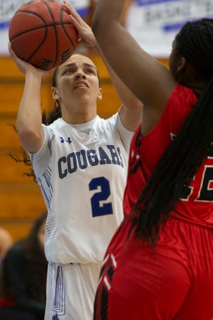 Barron Collier High School's Deydra Ramos takes aim at the basket during the Class 5A-Region 3 girls basketball semifinals game against Port Charlotte, Tuesday, Feb. 16, 2021, at Barron Collier High School.