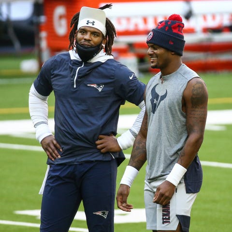 Could free agent Cam Newton, left, and Houston's D