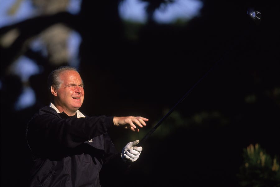 Rush Limbaugh watches the ball after teeing off during the AT&T Pebble Beach Pro-AM at the Spyglass Hill Golf Course in Pebble Beach, California on Feb. 2, 2001.