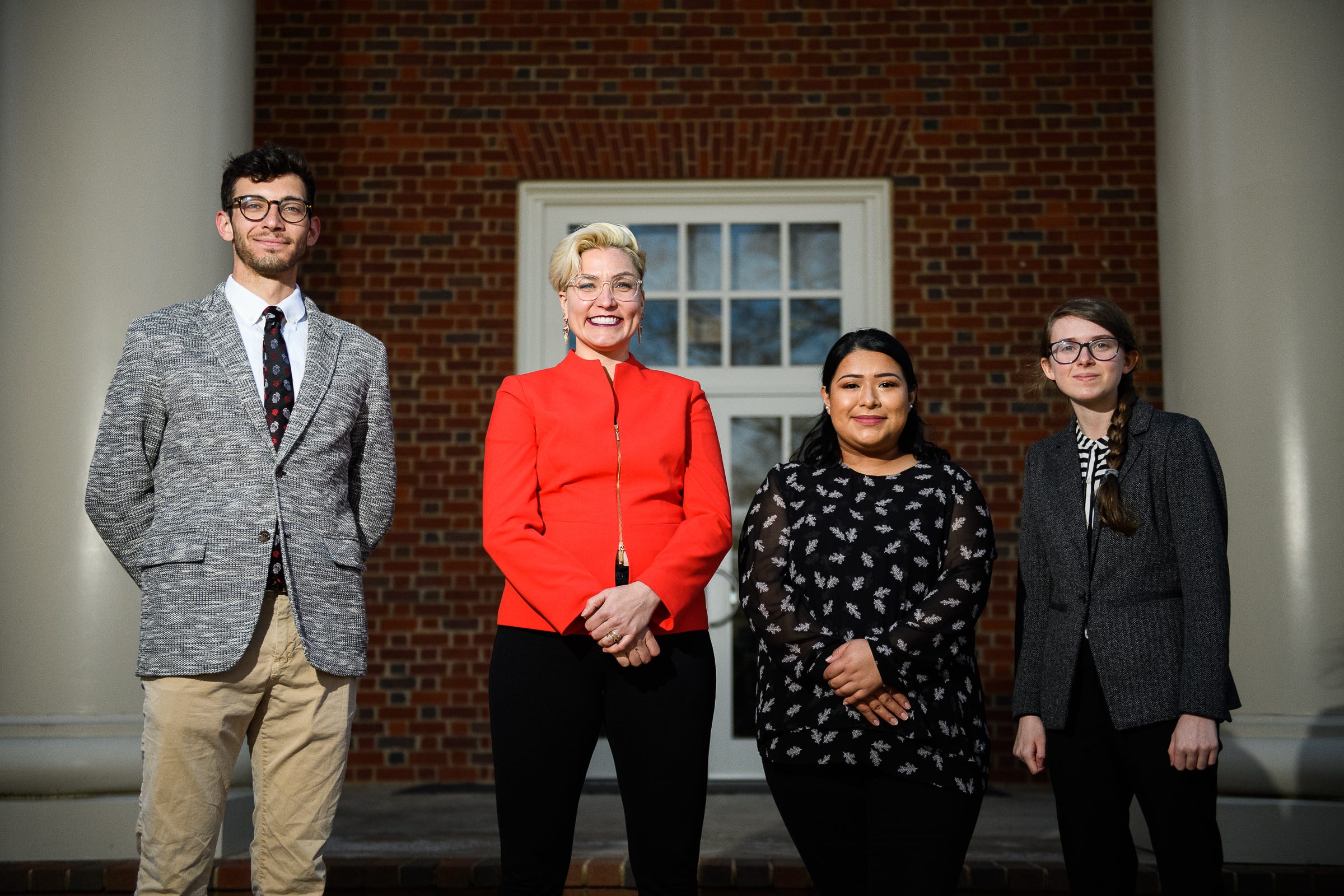 Brittany Arsiniega of The Justicia Project, middle left, poses for a portrait with her interns Allyson Stevens, Ingrid Ramos and Ryan Adams at Furman University Wednesday, Feb. 18, 2021.