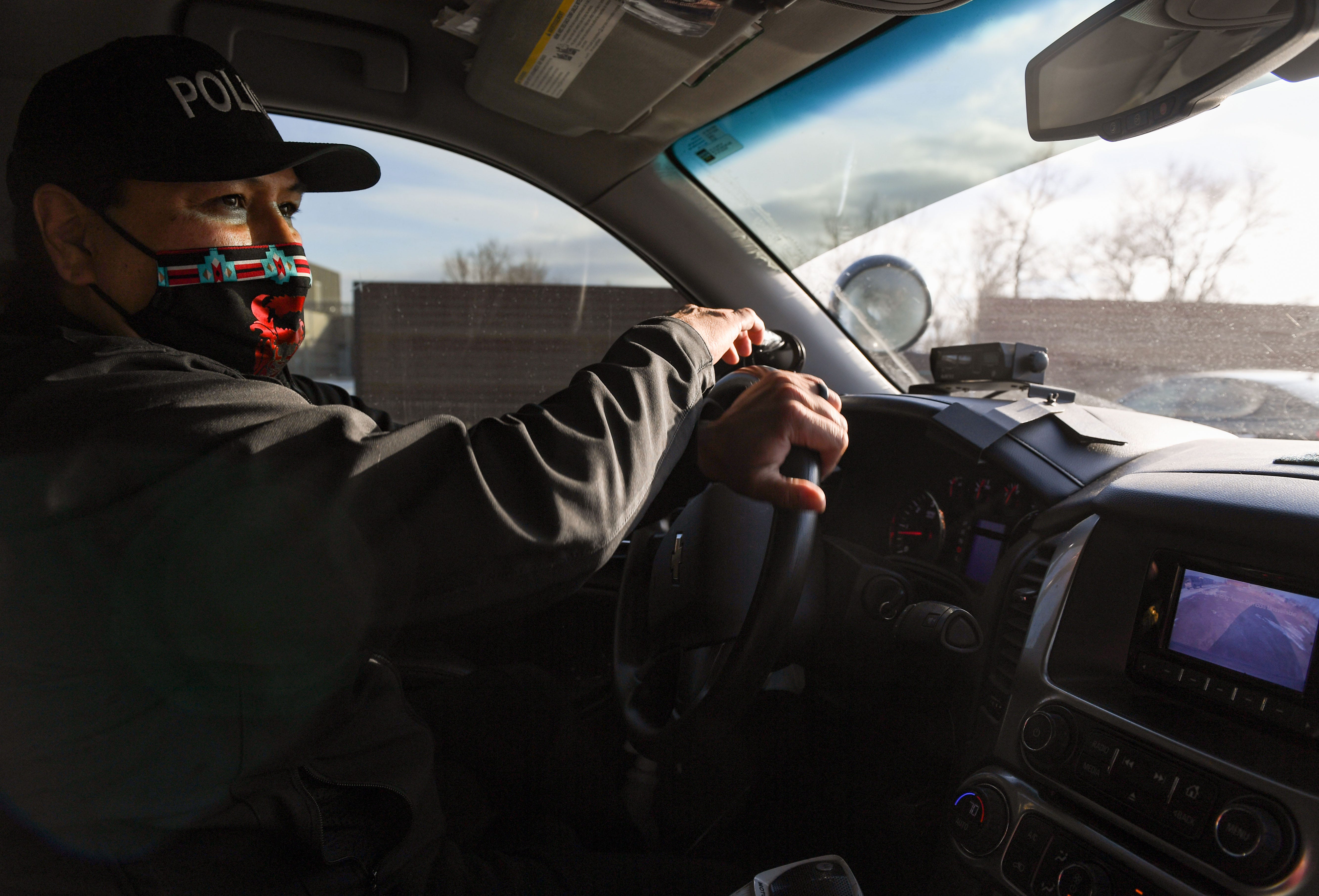 Joe Brings Plenty takes a patrol car out while working as a lieutenant for the Cheyenne River Sioux Tribe Police Department in Eagle Butte, South Dakota.