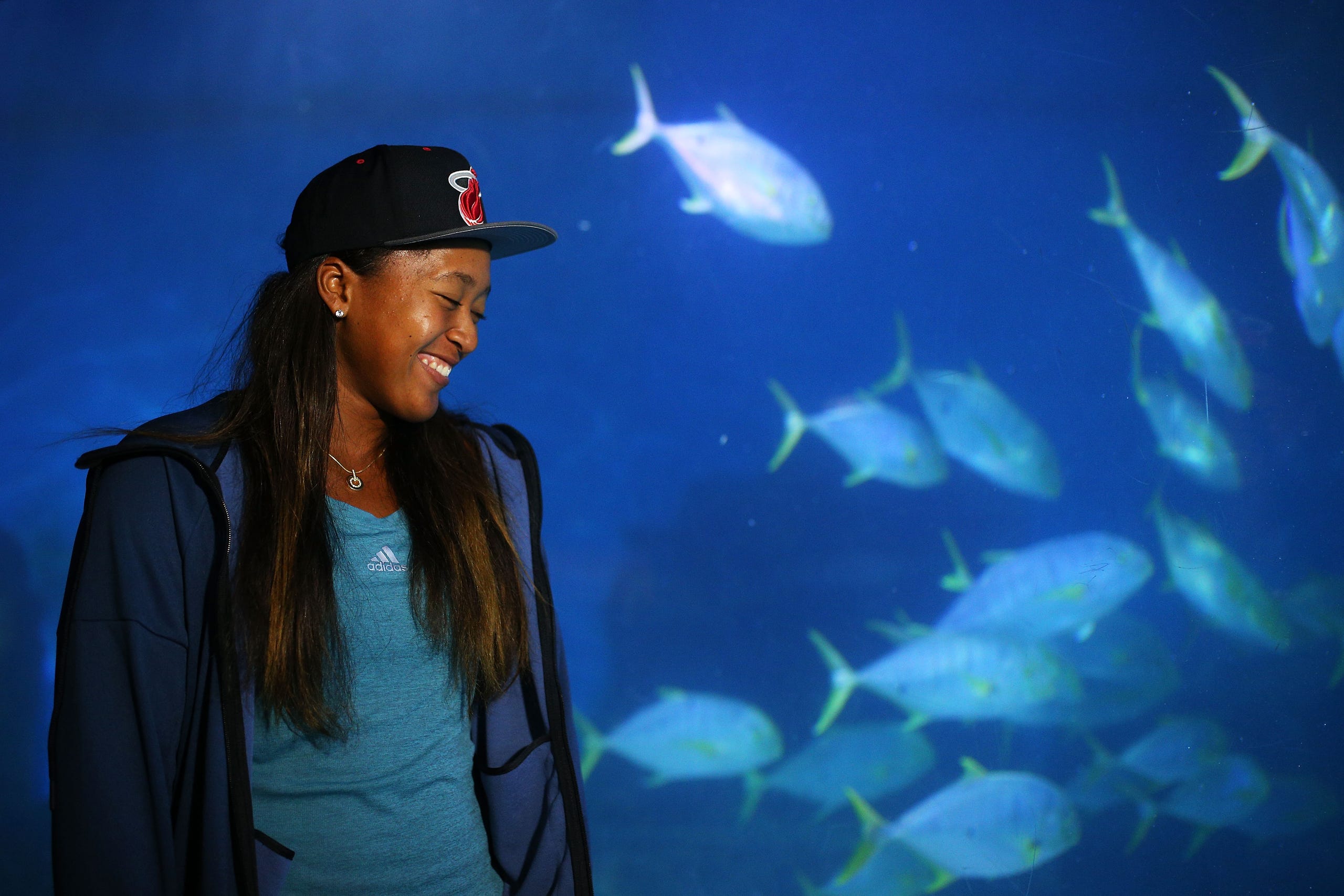 Naomi Osaka smiles as she visits Melbourne Aquarium during day three of the 2016 Australian Open at Melbourne Park on January 20, 2016 in Melbourne, Australia.