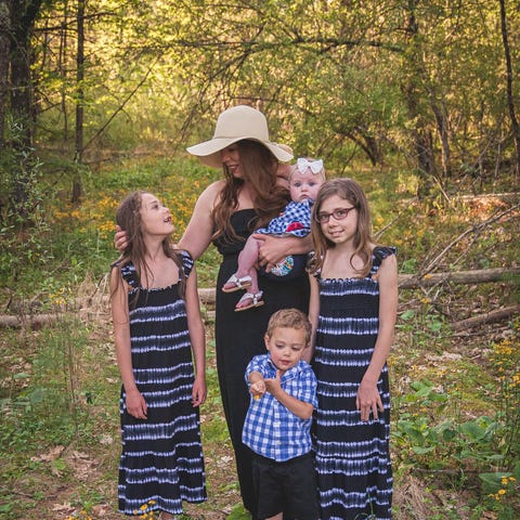 Meghan Hullinger (Center) poses with her four chil