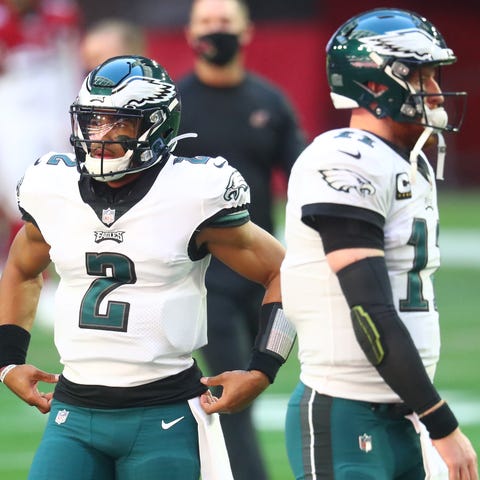 Jalen Hurts (2) and Carson Wentz spent 2020 as Eag